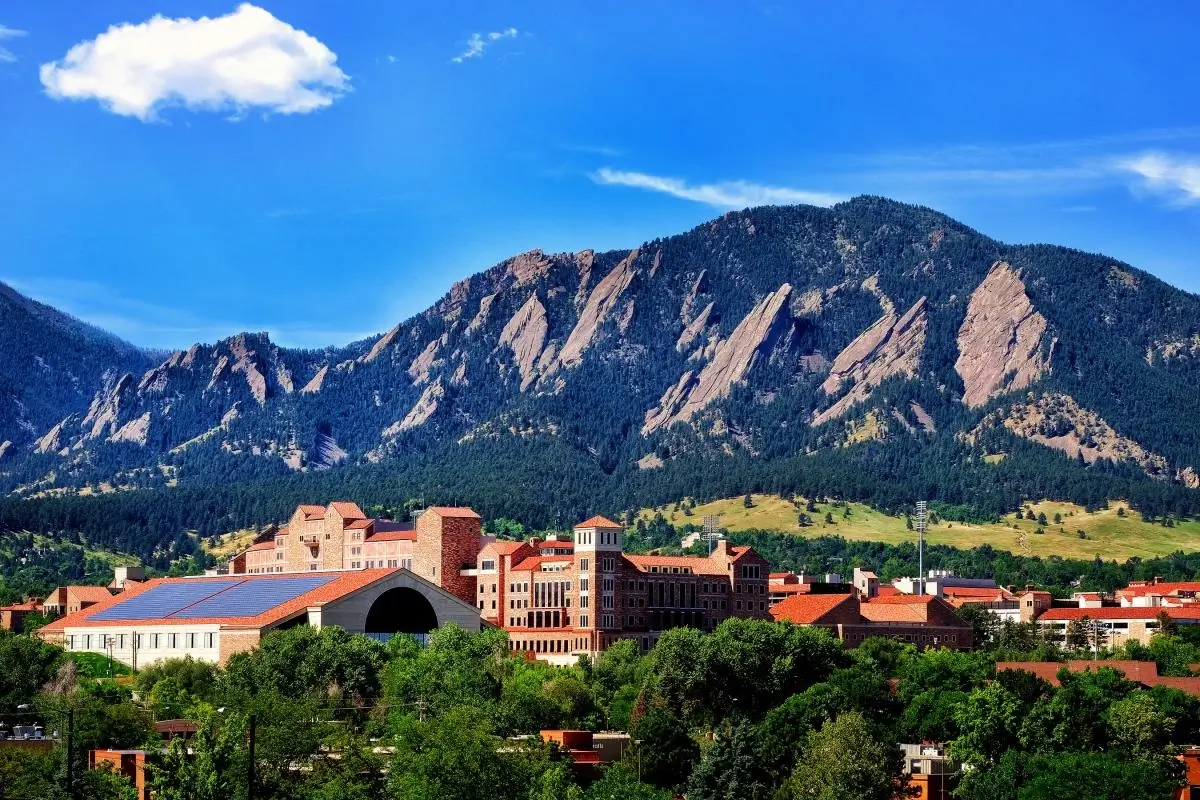 Boulder Colorado Flatirons mountain view with University of Colorado campus, private car service Boulder to Denver airport