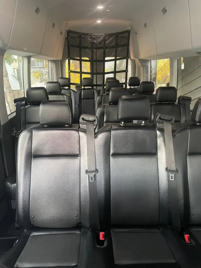 Spacious Colorado shuttle service van interior with comfortable seating for groups and tailgating transportation options