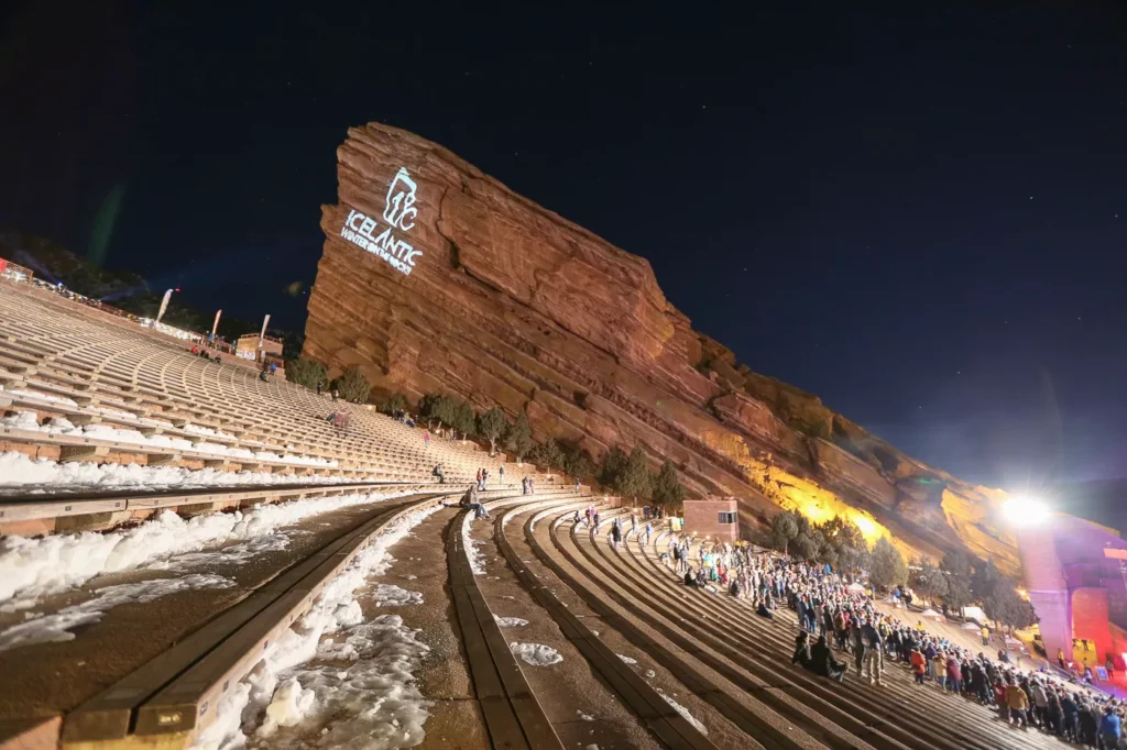 Red Rocks Amphitheatre winter concert night view. Private concert shuttle service by Mr. Chauffeur Colorado.