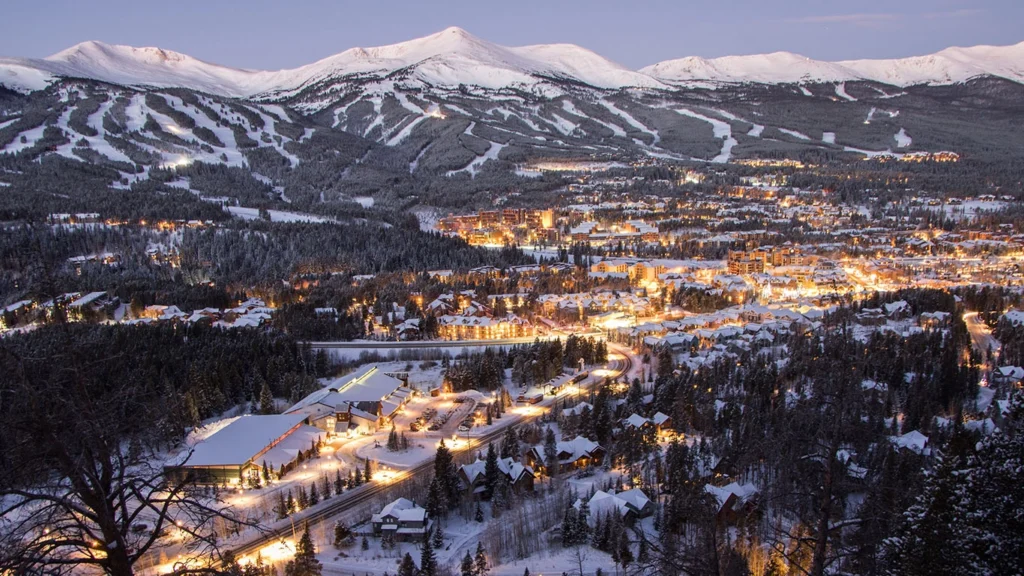 Panoramic night view of Breckenridge town and ski slopes. Private luxury shuttle to Breckenridge by Mr. Chauffeur Colorado.