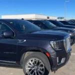 Our fleet of black luxury SUVs featuring GMC. Private airport car service by Mr. Chauffeur Colorado